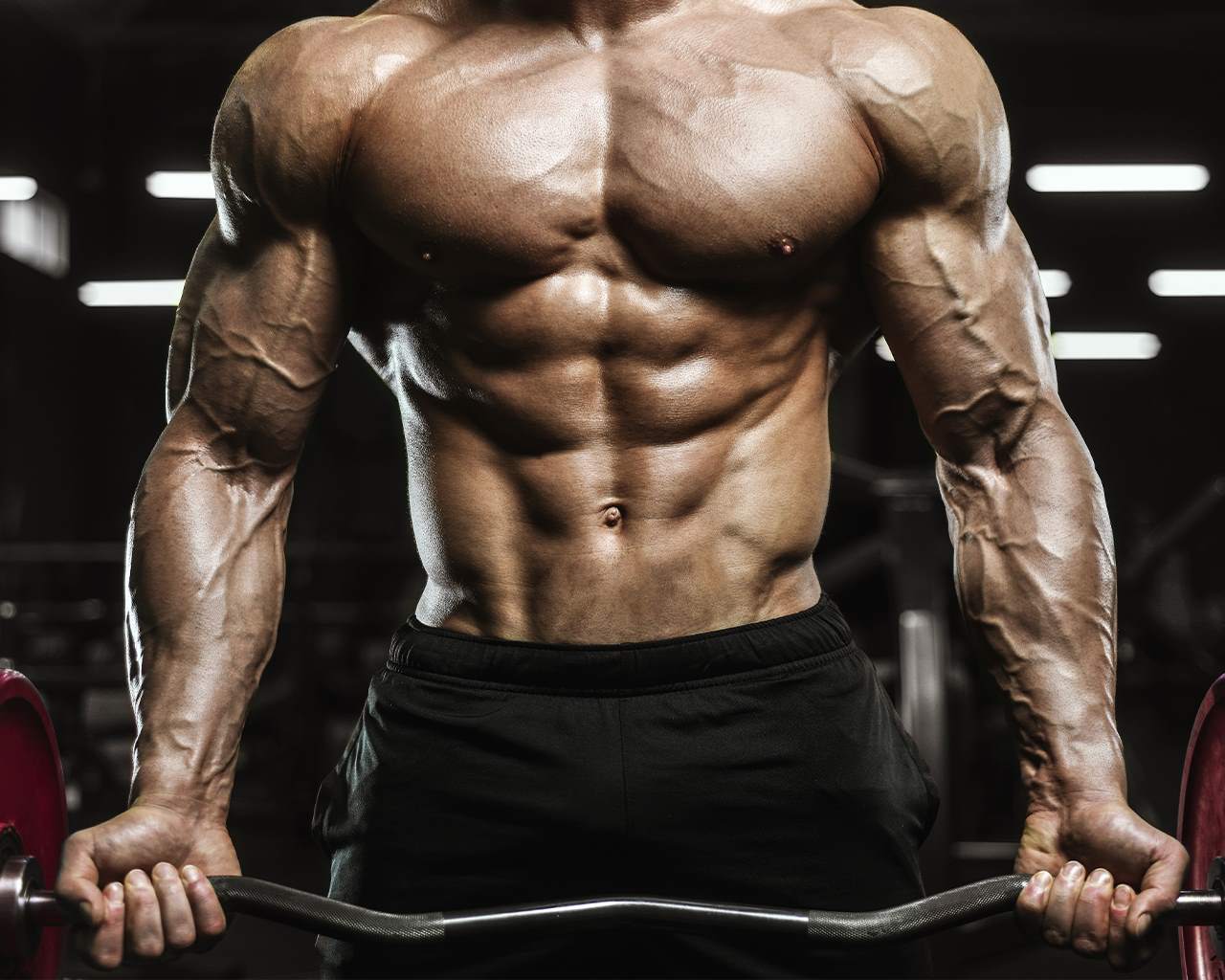 atleta-con-pesas-mostrando-fuerza-y-resistencia